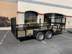 Tandem Axle Landscaper With High Sides & Spring Assist Gate Ramp
