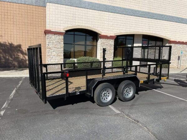 Tandem Axle Landscaper With High Sides & Spring Assist Gate Ramp